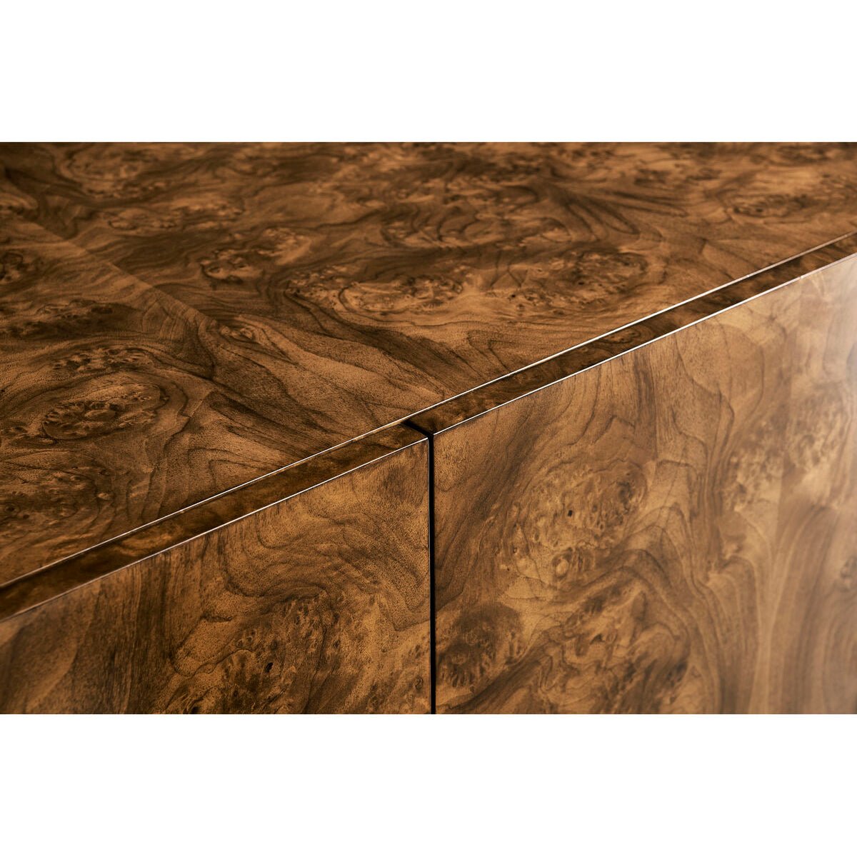 Close-up of sideboard corner detailing wood finish.