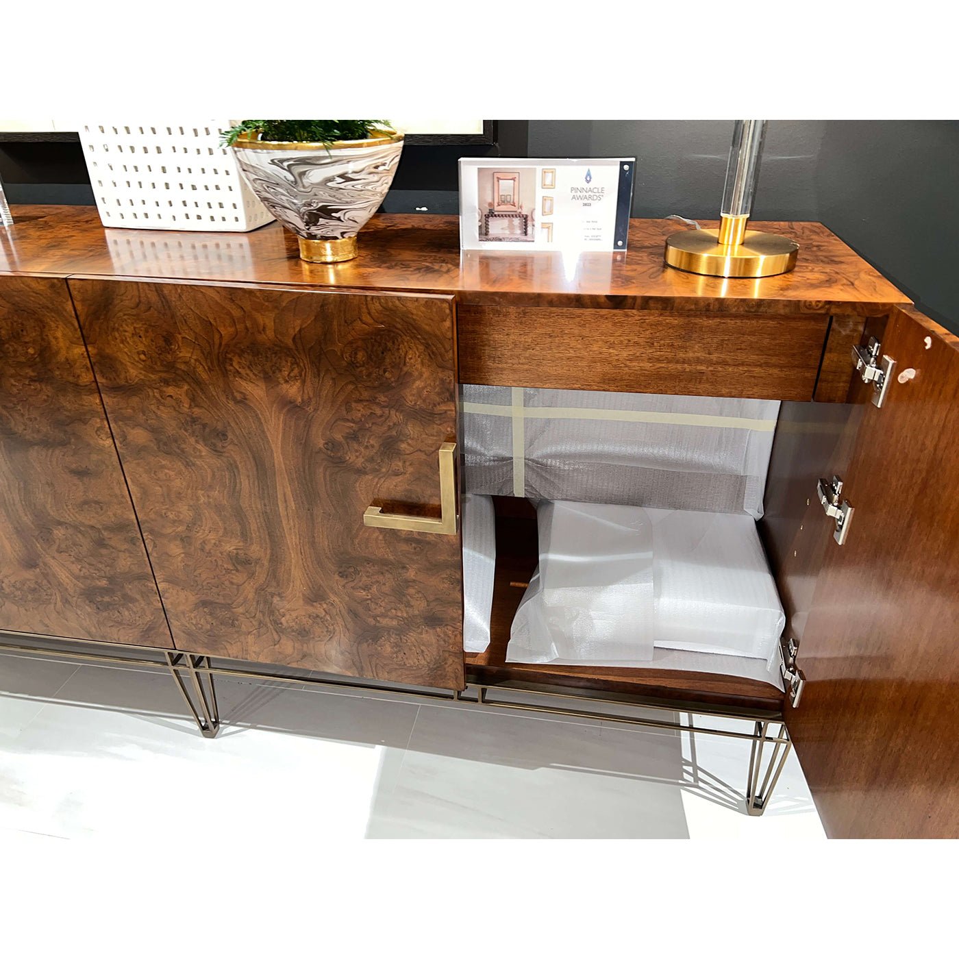 Open sideboard showing interior layout and design.