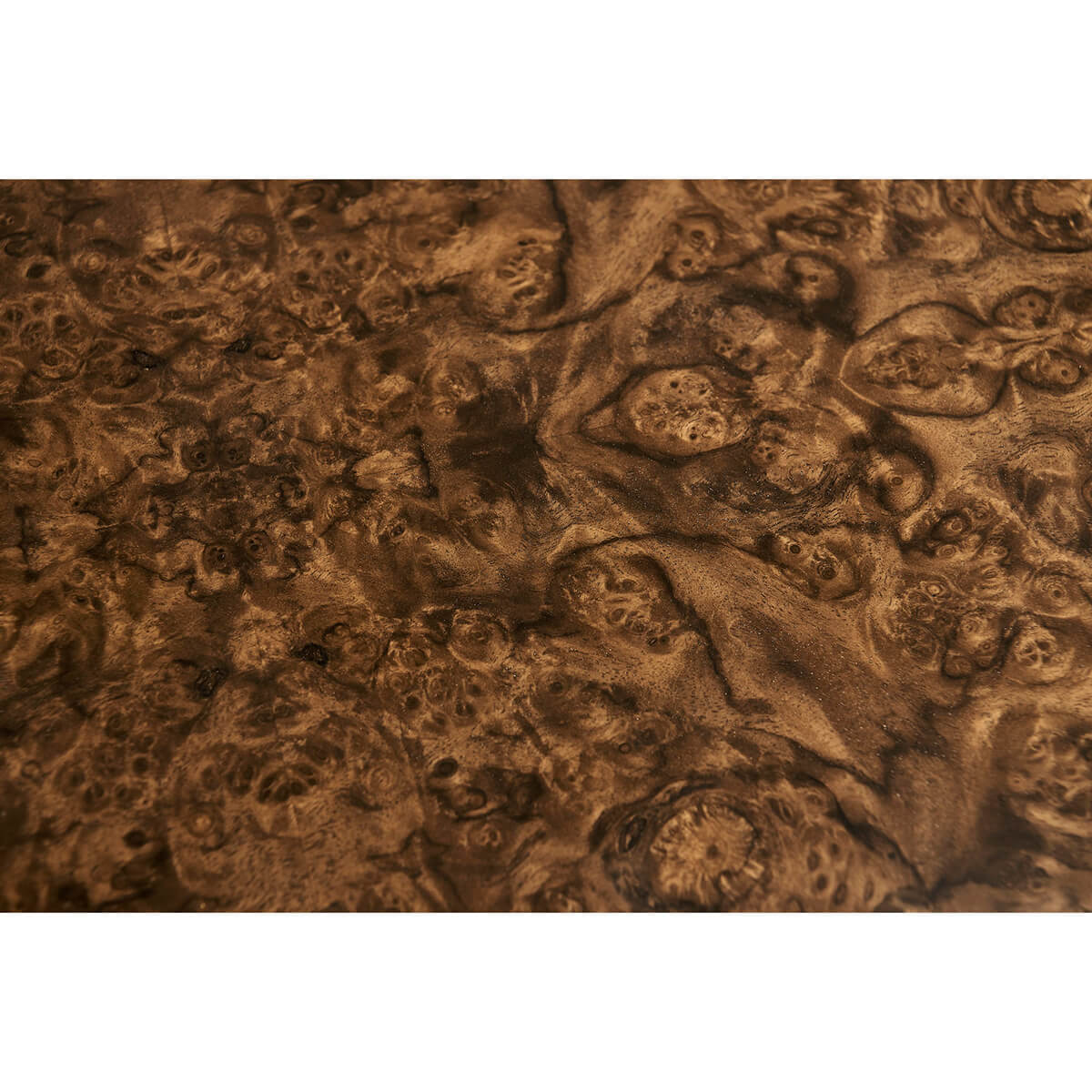 Detailed view of burl wood pattern on end table.