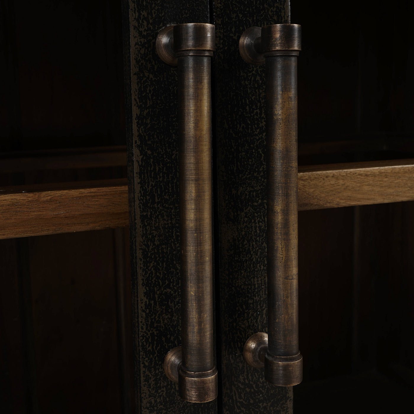 Sideboard close-up on rustic handles, dark finish.