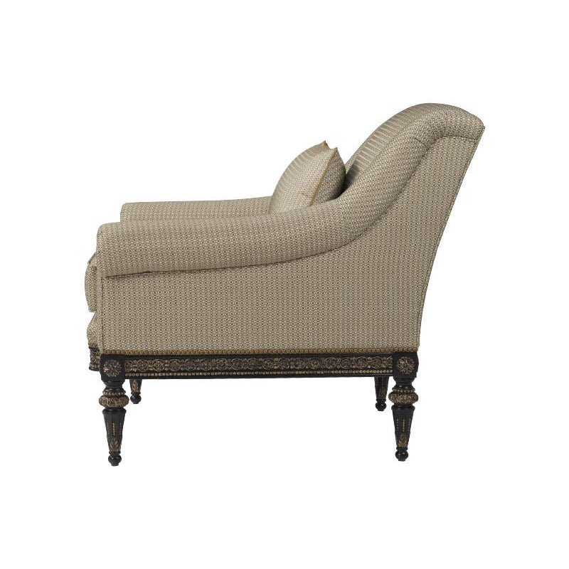Beige fabric armchair, side view.