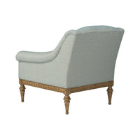 Light blue fabric armchair, back view.
