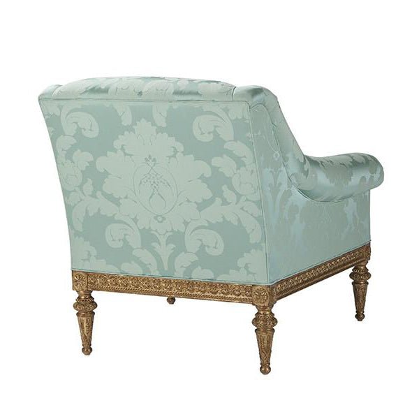 Patterned light green armchair, back view.
