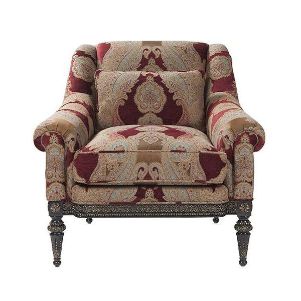 Red floral patterned armchair, front view.