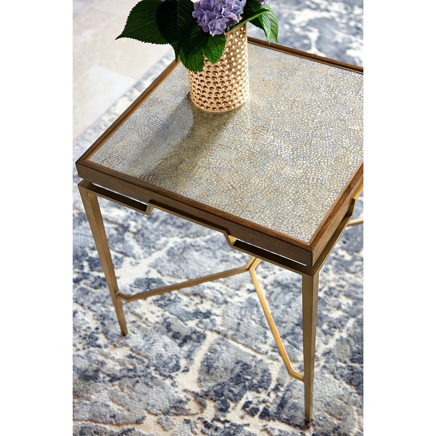 Decor on square end table with metal frame