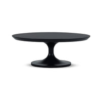 Black modern tulip coffee table on white background.