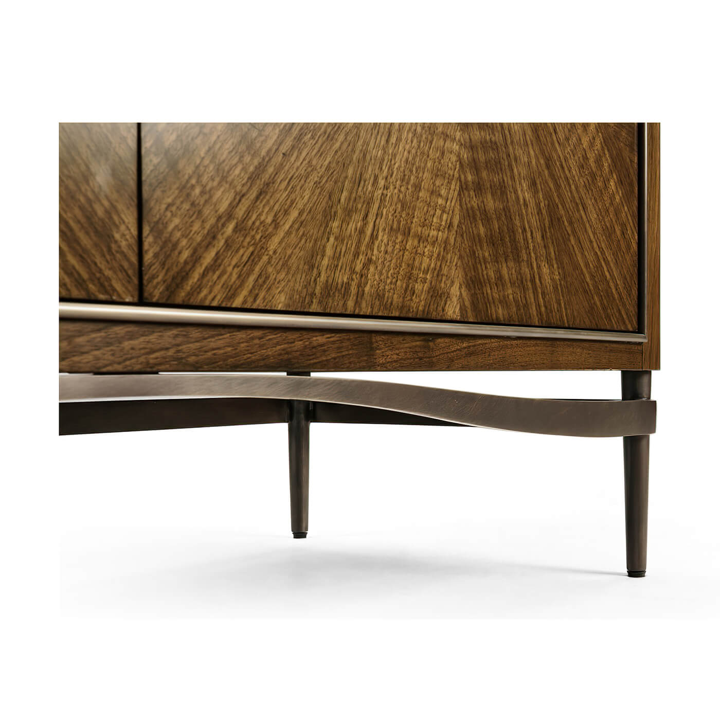 Modern cabinet leg detail with sleek, curved design.