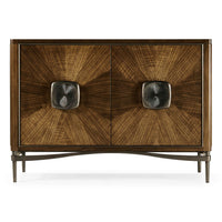 Front view of walnut cabinet with sunburst pattern.