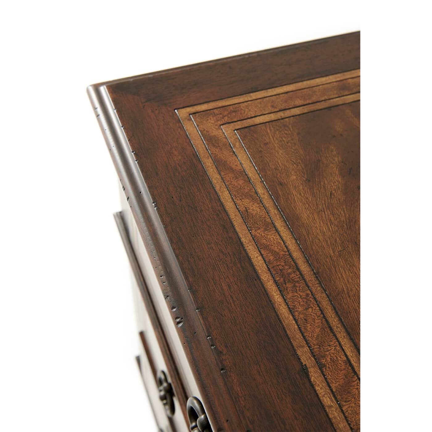 Corner detail of French Neoclassic dresser with wood inlay.