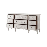 Open drawers of French painted antique style dresser.