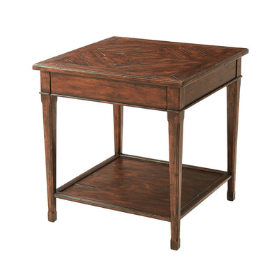 Angled view of French Provincial antiqued end table.