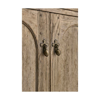 Detail of sideboard door handles and wood texture.