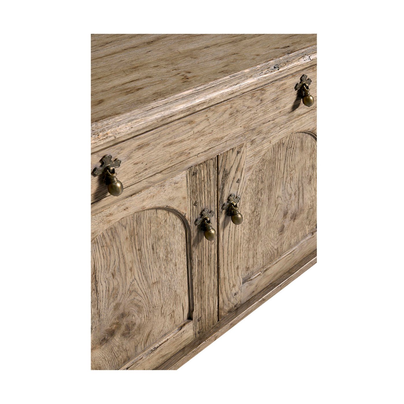 Close-up of sideboard's top and door handles.