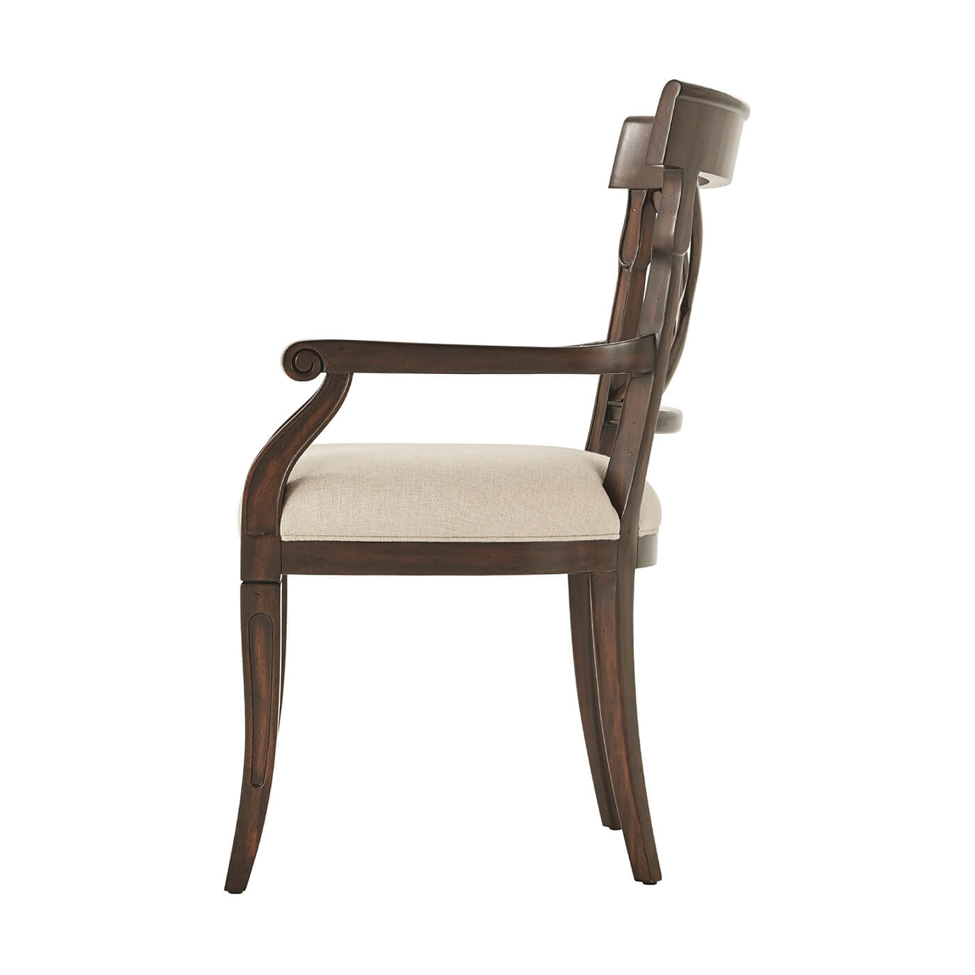 Side view of French Provincial armchair, elegant curved wood.