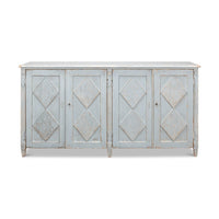 Front view of blue sideboard with four doors.