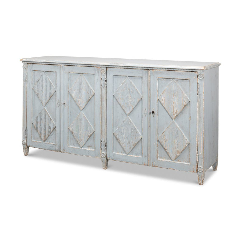 Distressed blue sideboard with diamond pattern doors.
