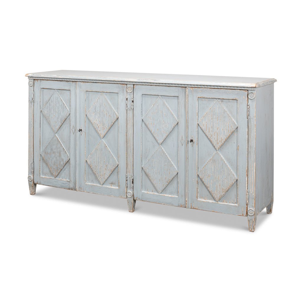 Distressed blue sideboard with diamond pattern doors.