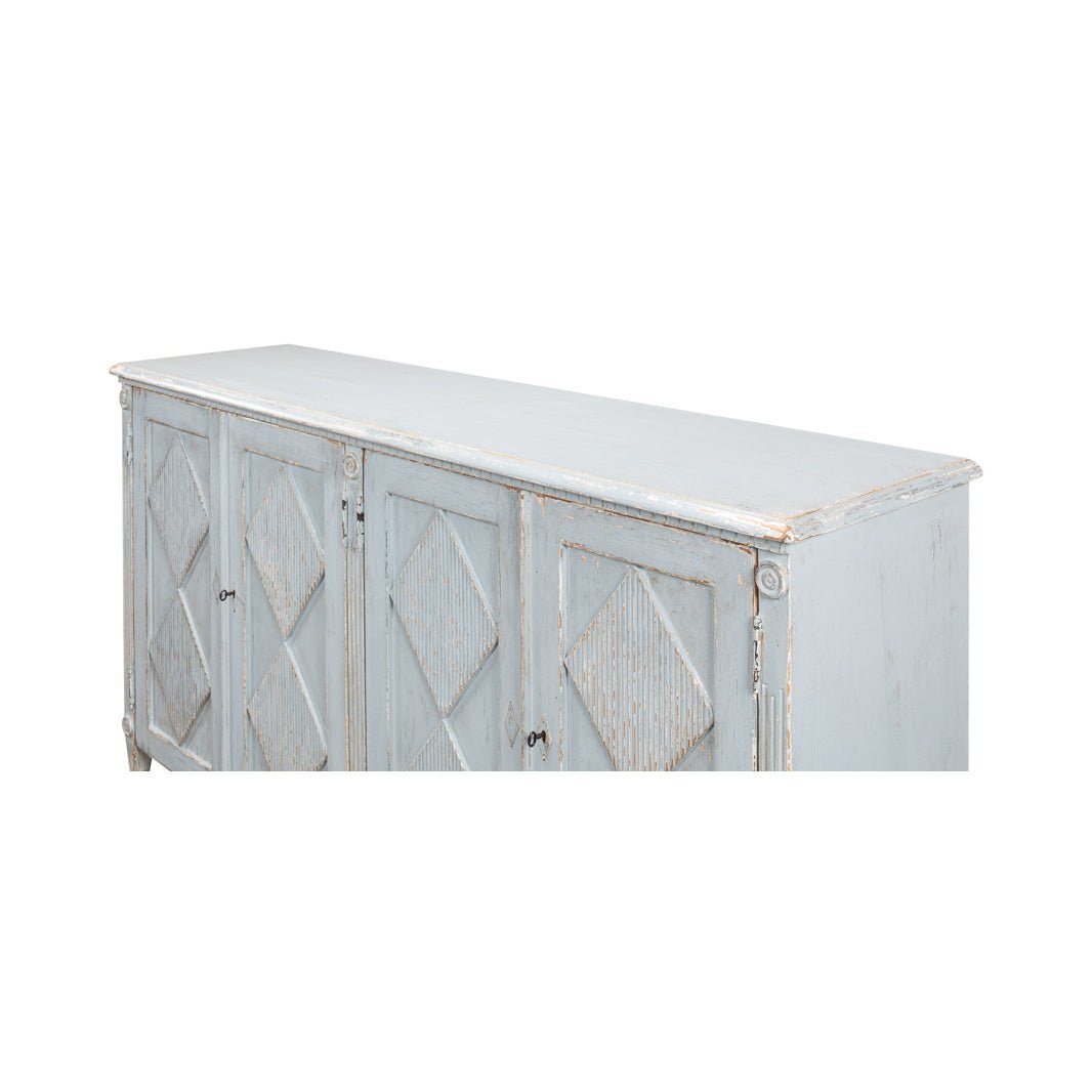 Angled view of blue painted sideboard.