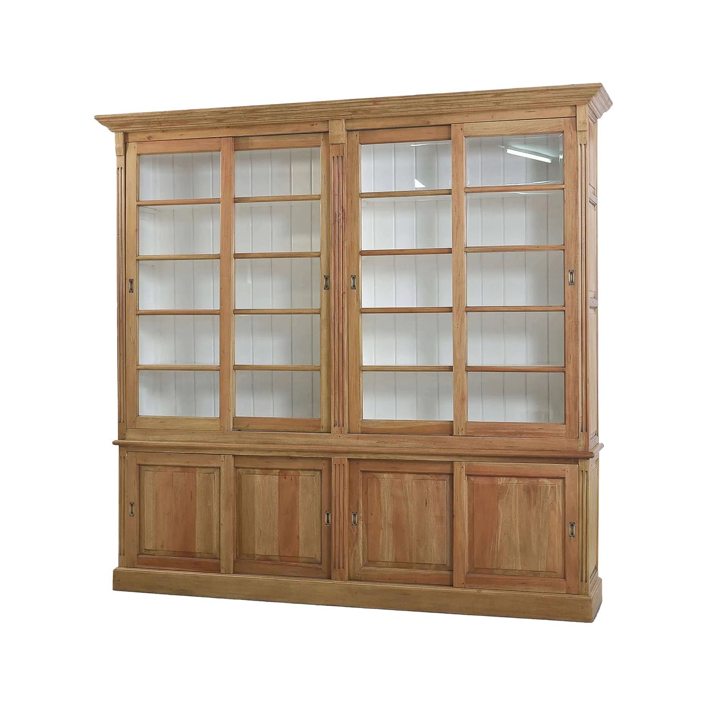 French Provincial bookcase angled view with sliding doors.
