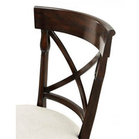 Detailed view of French Provincial chair backrest and cushion.