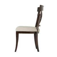 Side profile of French Provincial dining chair, elegant design.