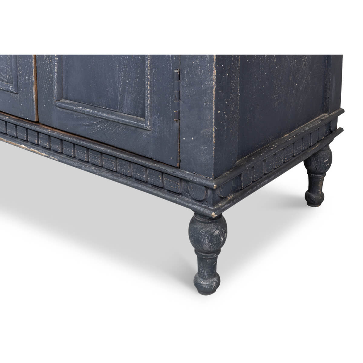 Bottom corner showing detailed legs of credenza.