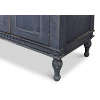 Bottom corner showing detailed legs of credenza.