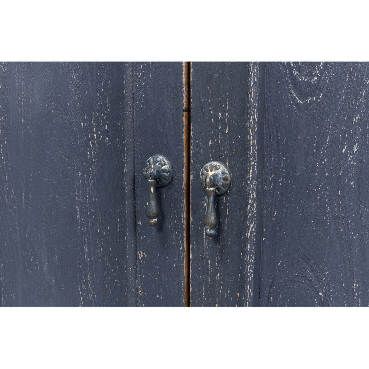 Close-up of door handles on chateau credenza.