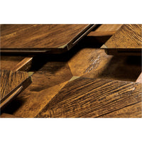 Close-up of extended leaf mechanisms of dining table.