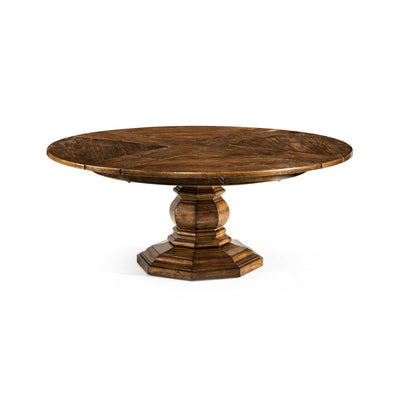 Round dining table with a sturdy pedestal base.