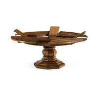 Extension leaves raised on round dining table.
