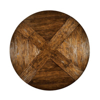 Overhead view of round dining table with visible details.