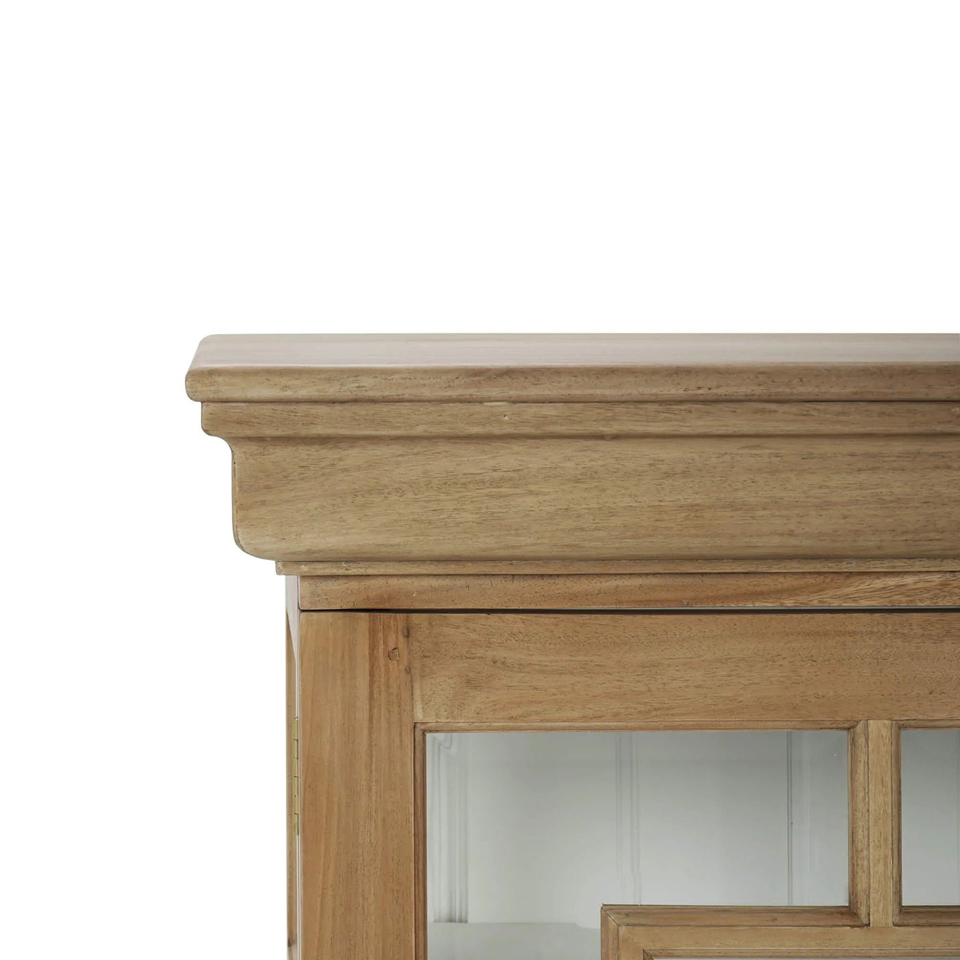 Close-up of credenza corner and molding detail.