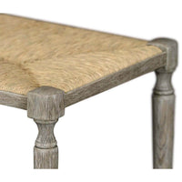 Close-up of French Provincial bench woven seat detail.