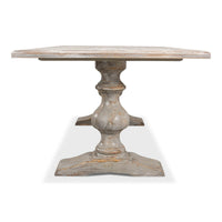 End view showcasing central pedestal support of table.