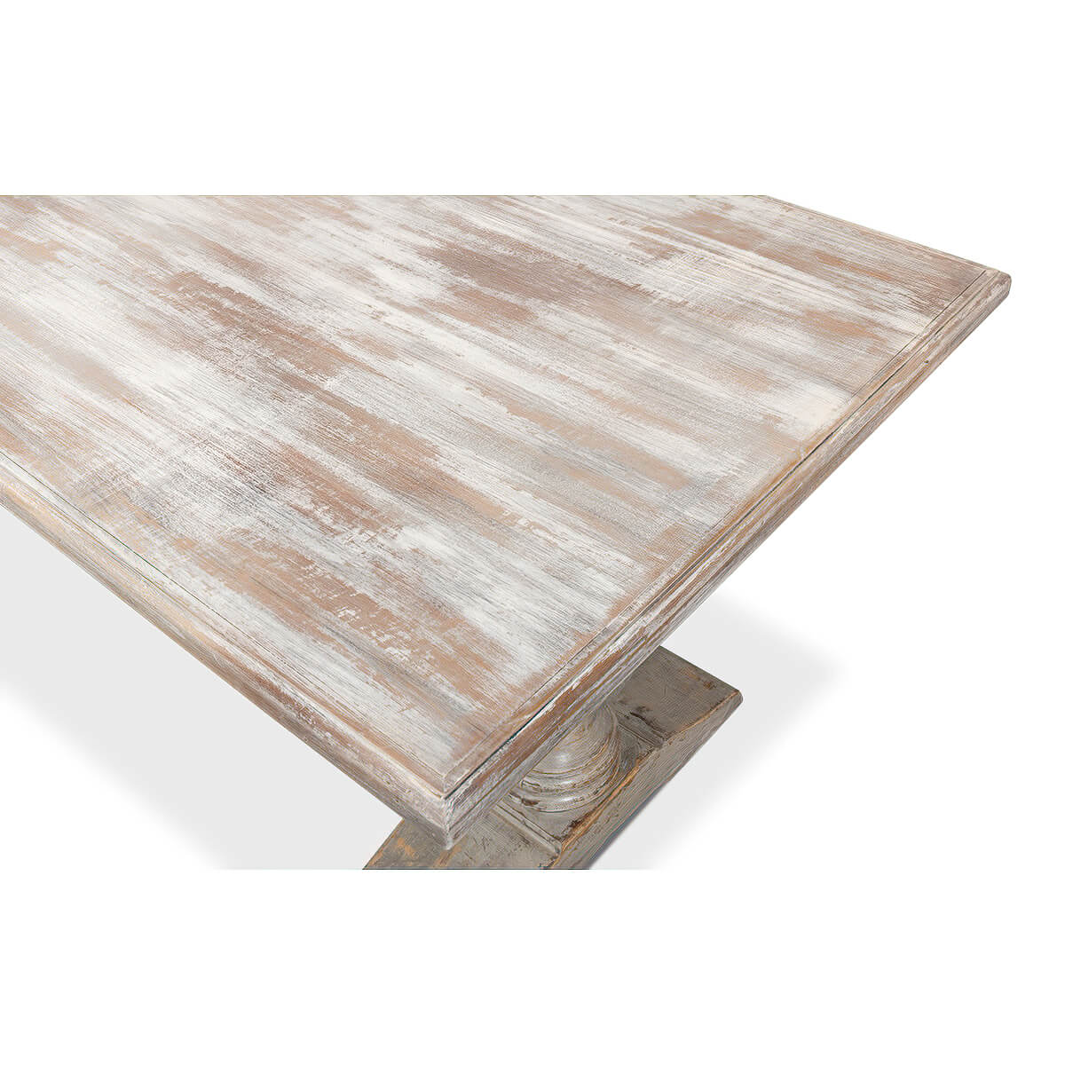 Close-up of distressed wooden tabletop of dining table.
