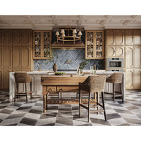 Spacious kitchen featuring large rustic island and cabinets.