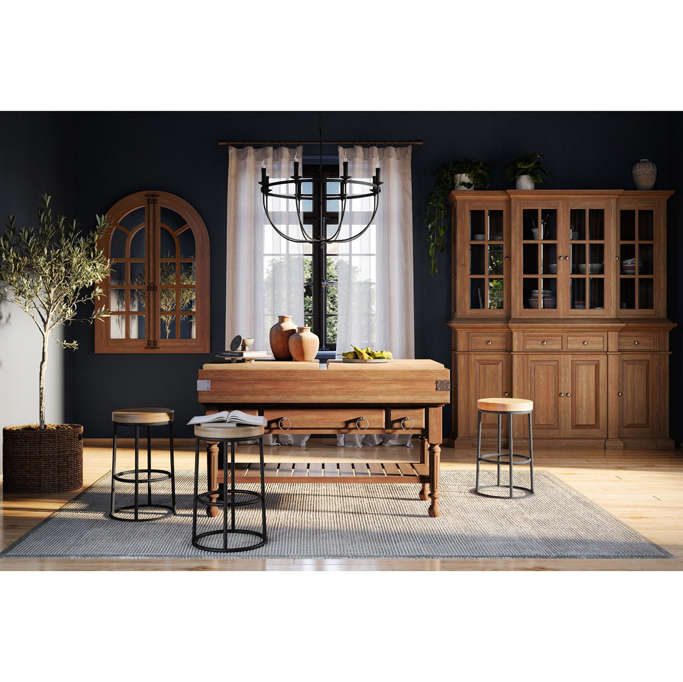Farmhouse kitchen setting with large wooden island centerpiece.