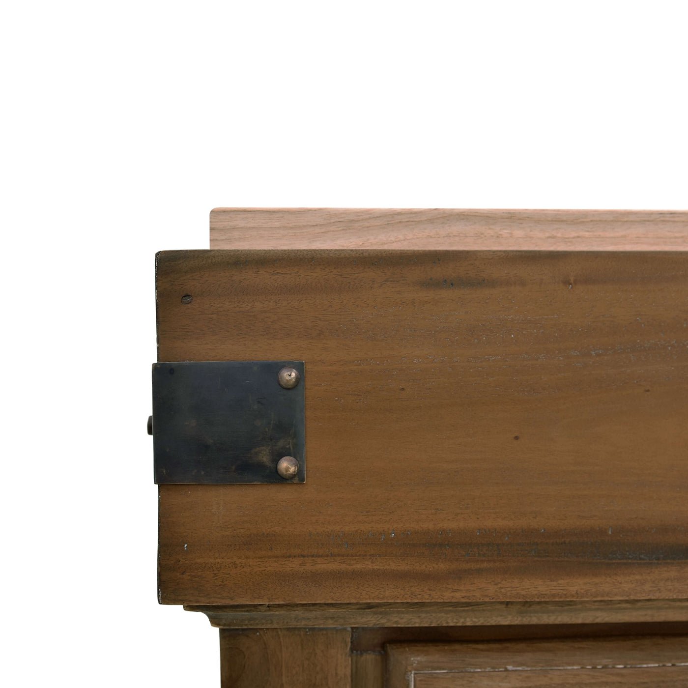 Close-up of metal corner bracket on kitchen island.