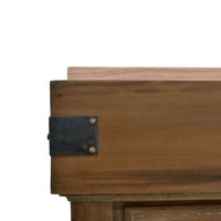 Close-up of metal corner bracket on kitchen island.