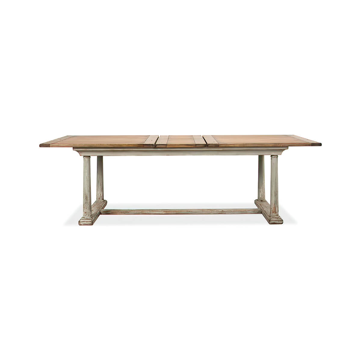 Dining table with leaves extended, side view.