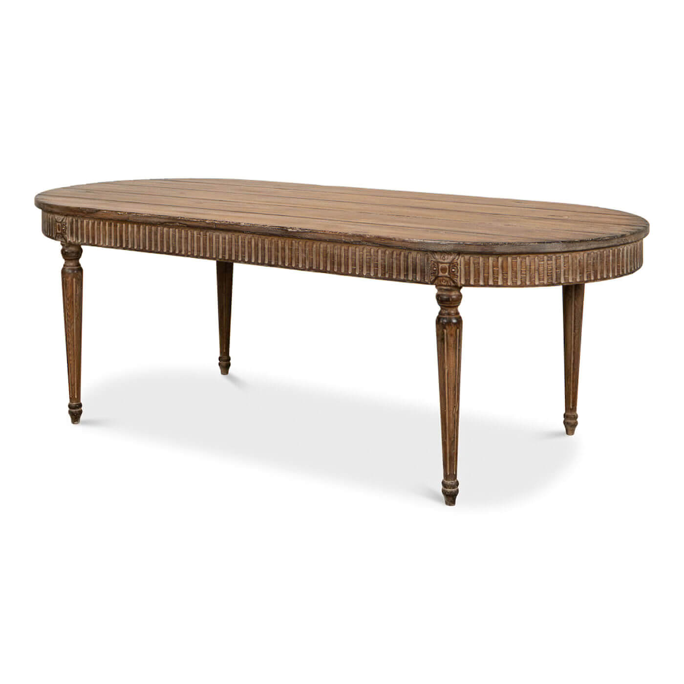 Side view of oval dining table with tapered legs.