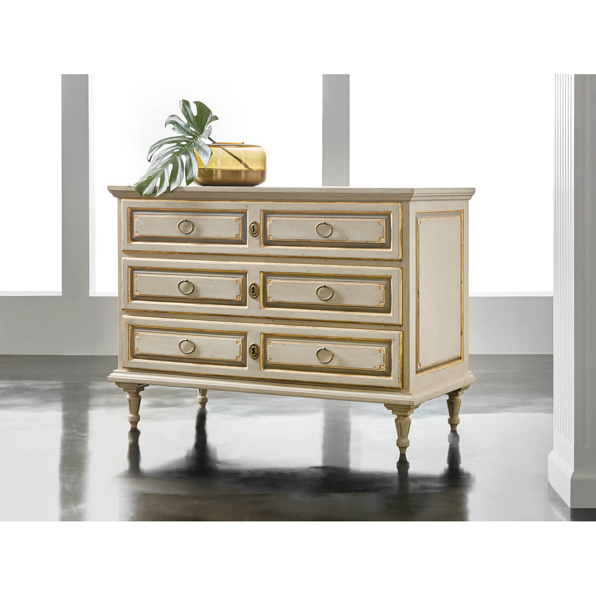 French Provincial chest in modern room, decorative accents.