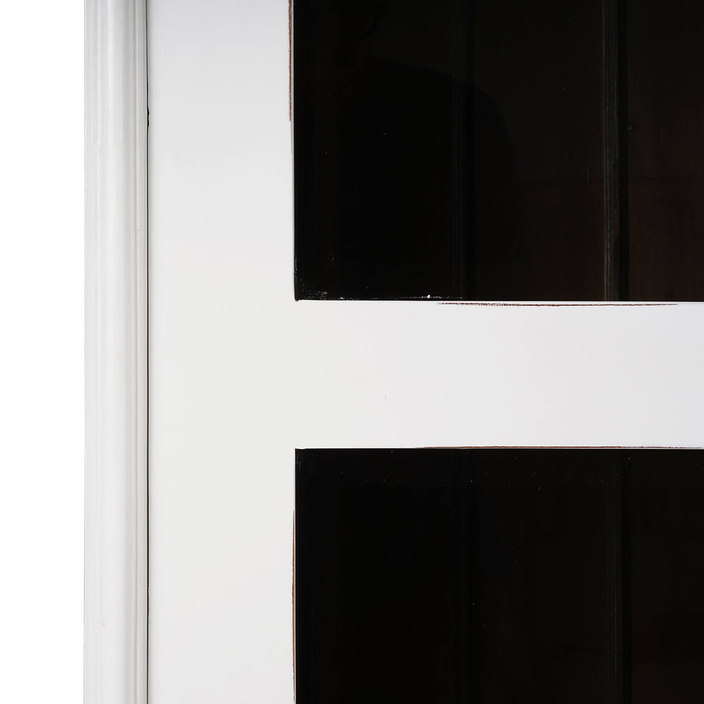 Close-up of French Provincial cabinet door frame, white finish.