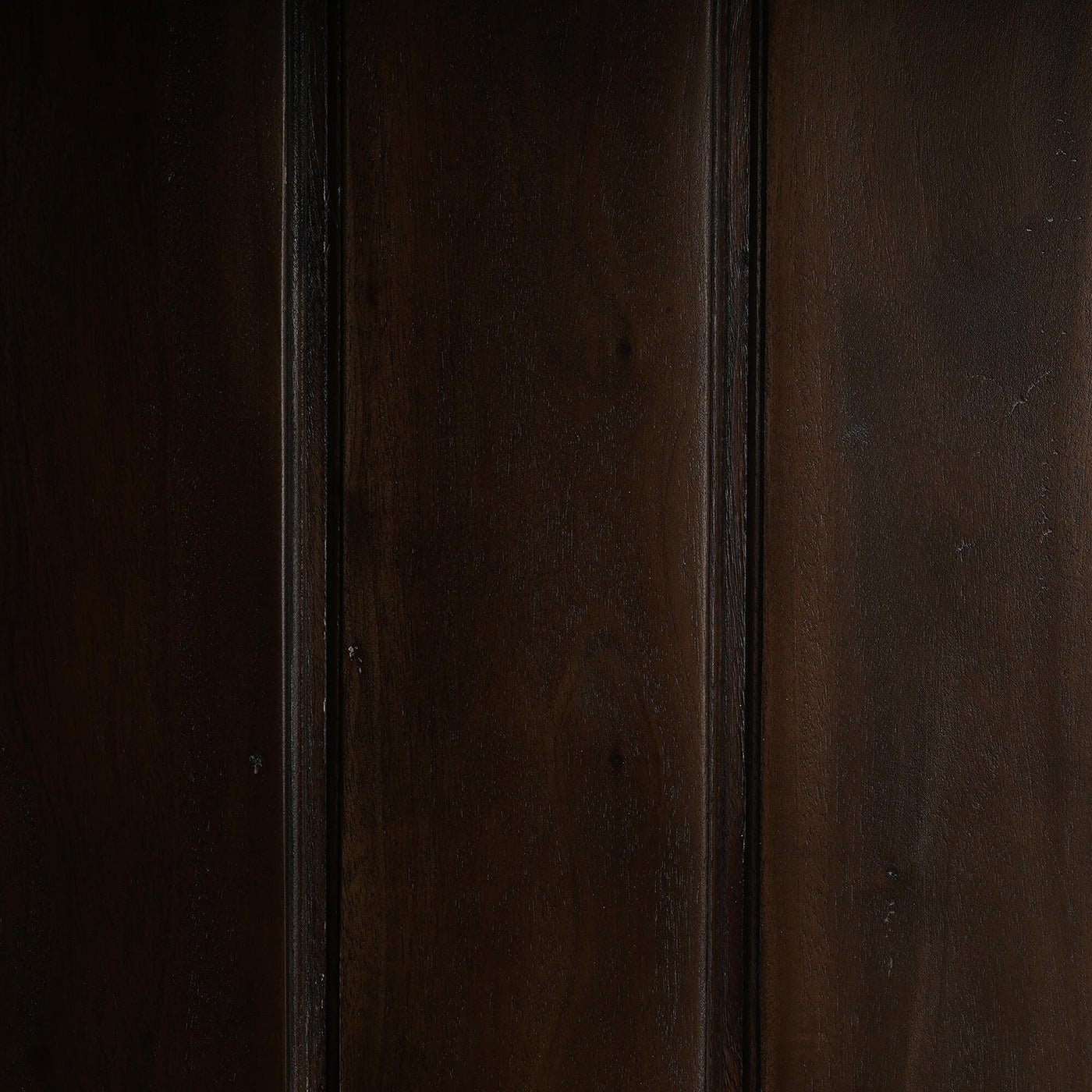 Interior wood paneling inside French Provincial display cabinet.