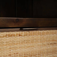 Close-up of wicker drawer under shelf.