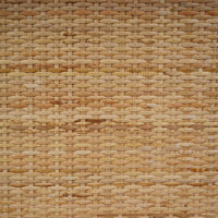 Detailed view of the wicker drawer texture.