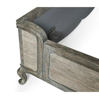 Corner detail of bed frame with metal fixture.