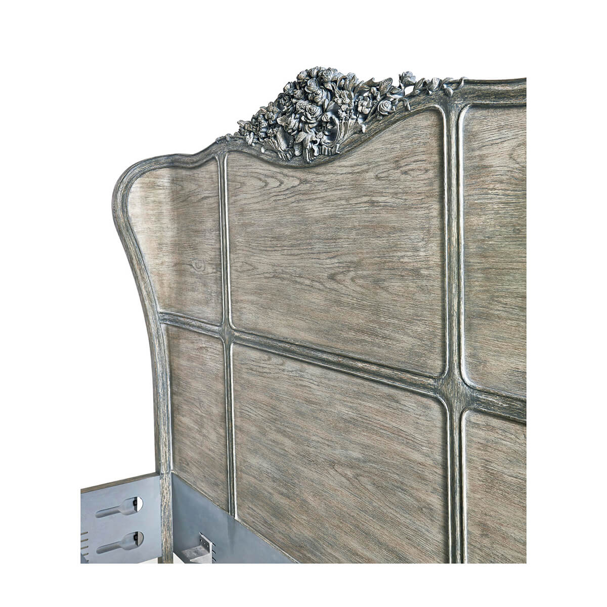 Side angle of headboard with floral detail.