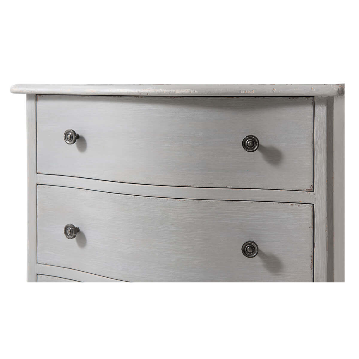 Close-up of drawer handles on gray nightstand.